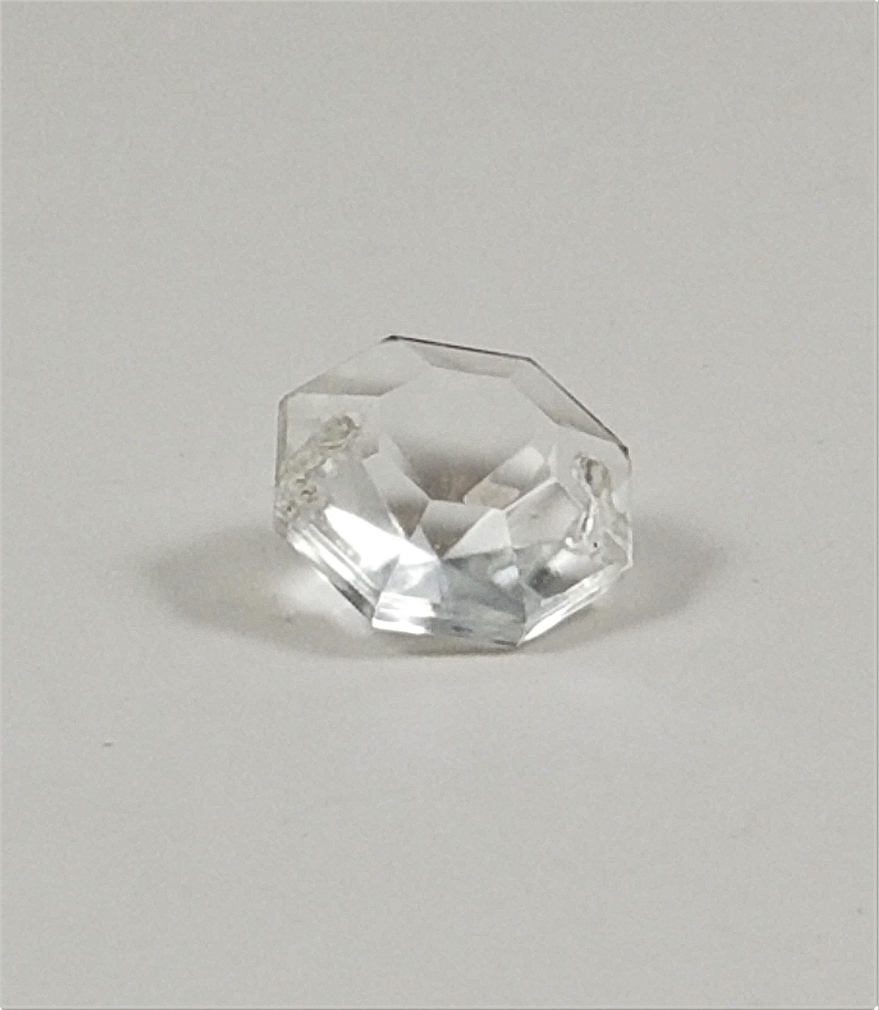 Octagonal Crystal Jewel with side holes.