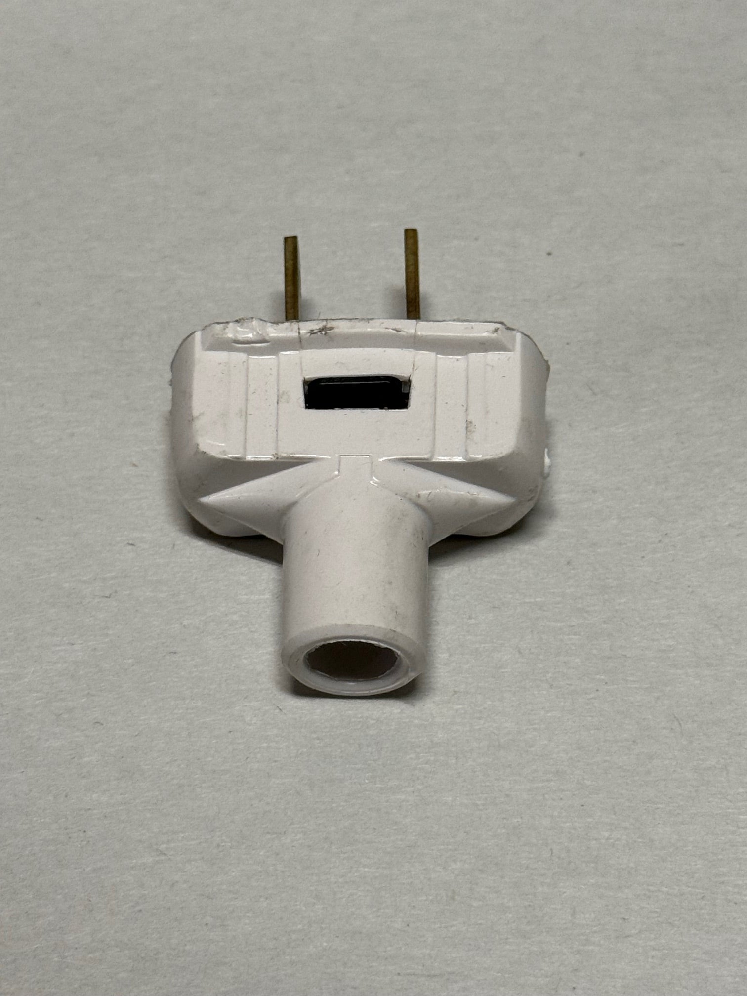 White Leviton 2-Pole, 2-Wire Flat Plug, 15A - 126V, UL Listed.
