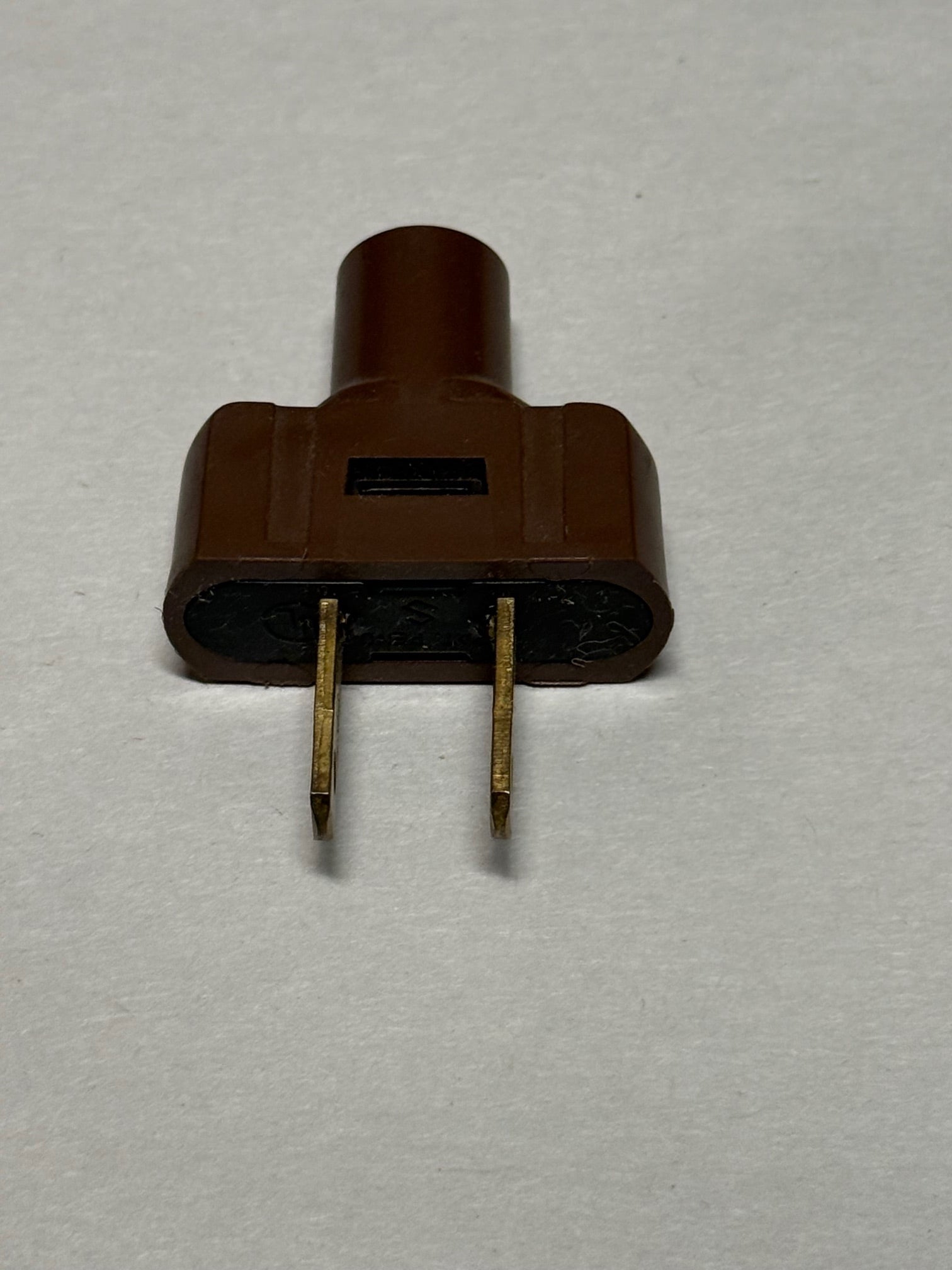 Brown Leviton 2-Pole, 2-Wire Flat Plug, 15A - 126V, UL Listed.