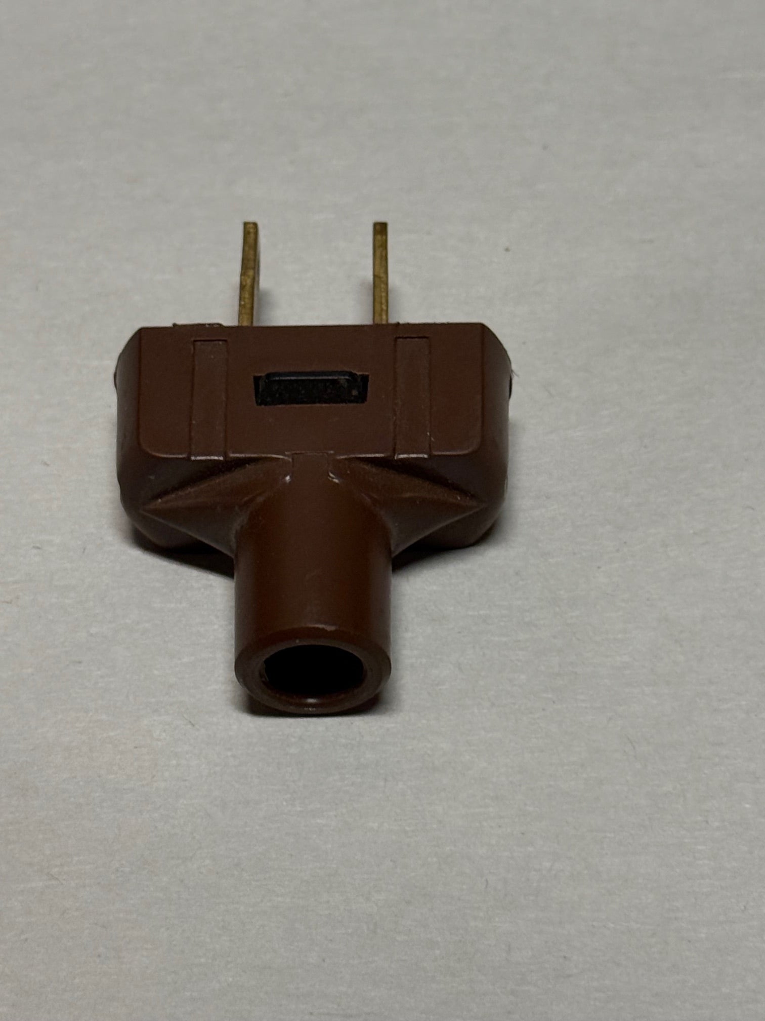 Brown Leviton 2-Pole, 2-Wire Flat Plug, 15A - 126V, UL Listed.