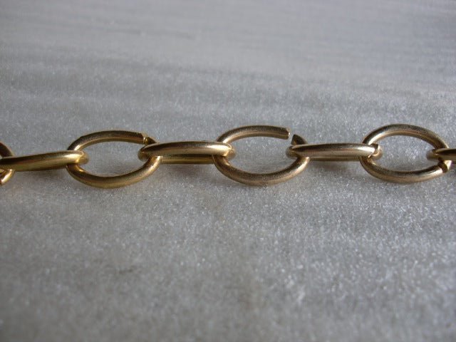 7/8" Small Oval Link Chain in Brass.