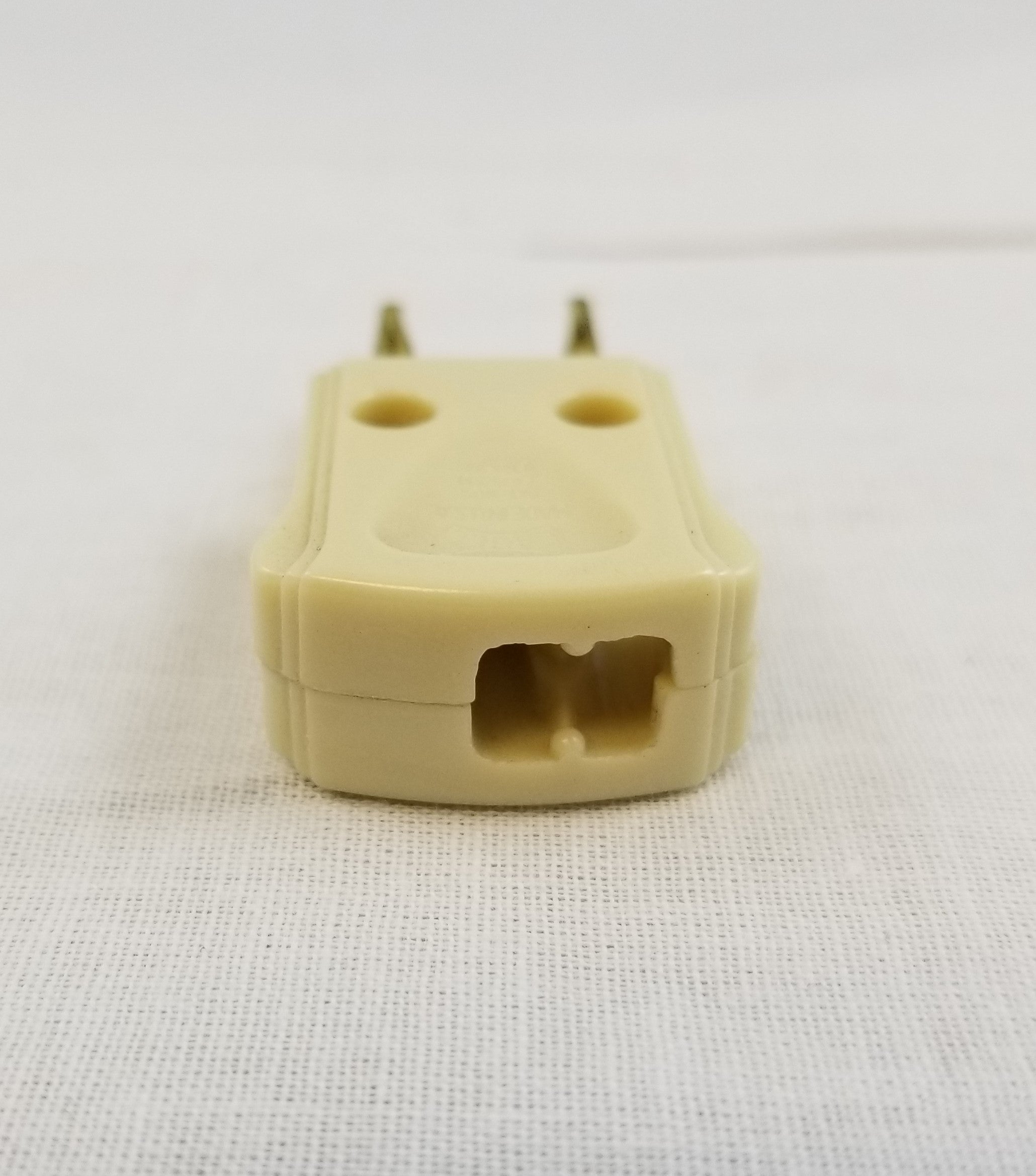 C.S.A. Approved Push/Pull Brass Spring Plug in Ivory.