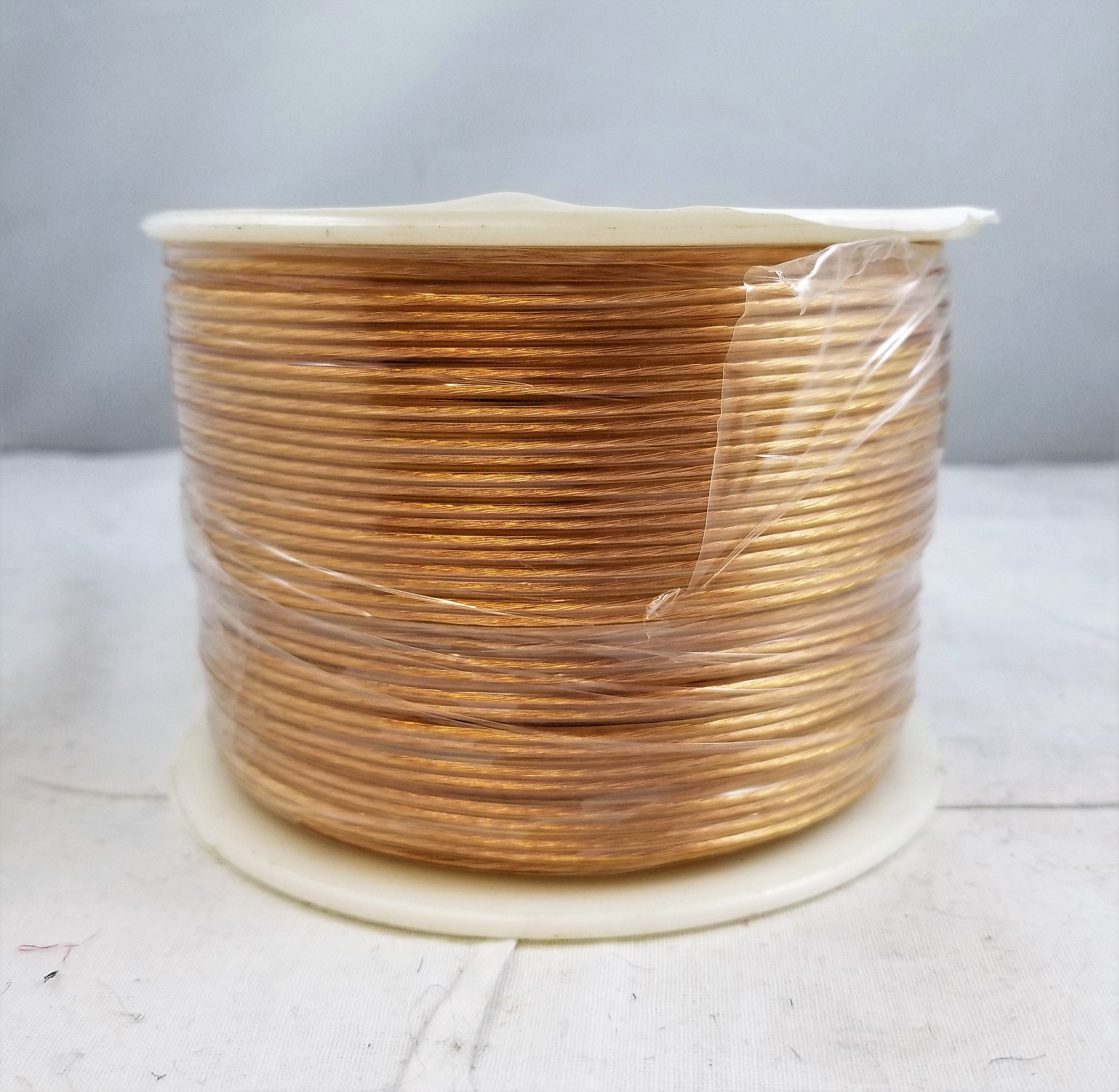 Foot of Thin Gold Transparent Plastic Lamp Cord 22/2 Gauge – My