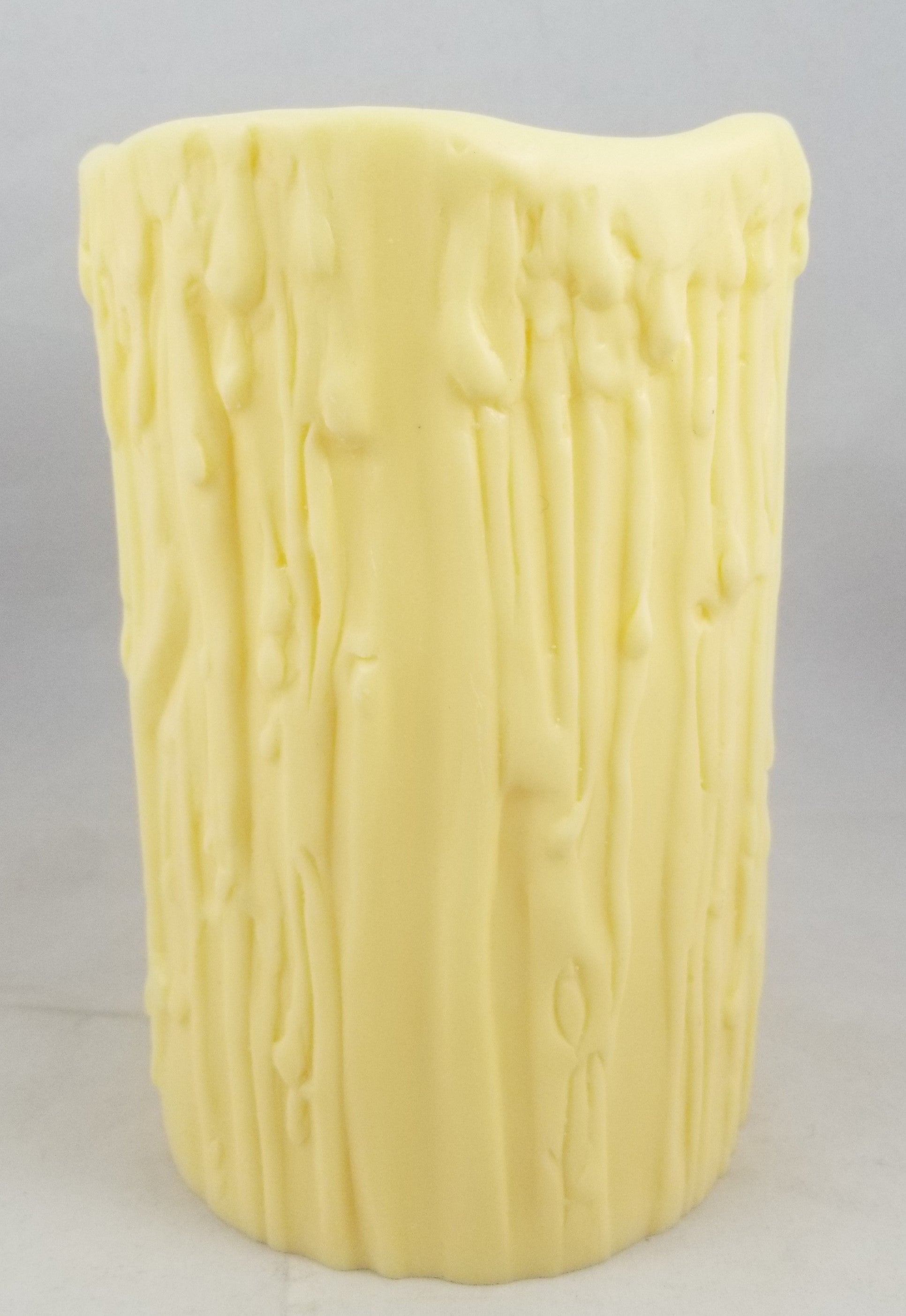 Ivory drip candle cover - 4 inches tall.