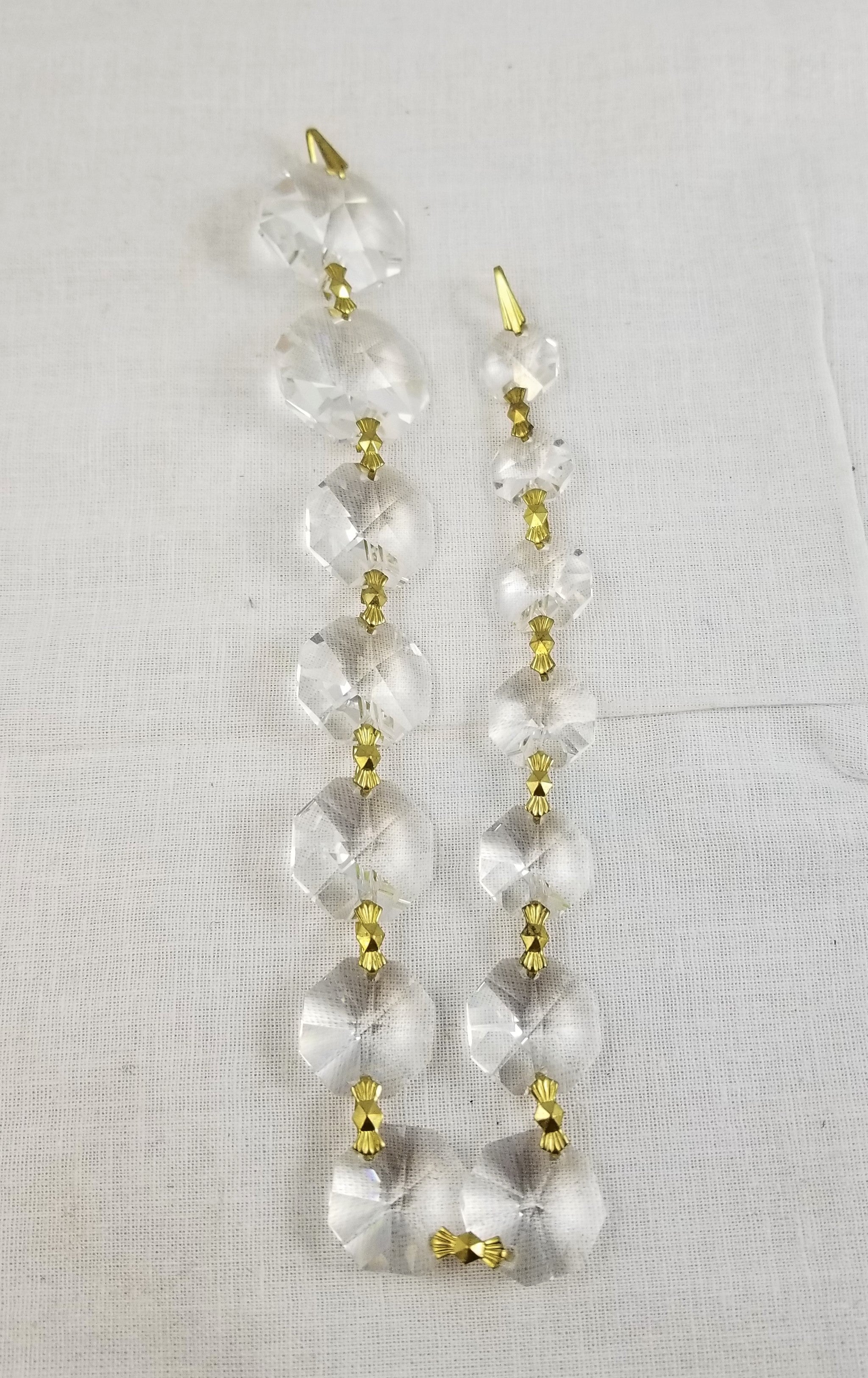 Strass Jewels - 7" Crystal Graduated Beads with Brass Bowtie Pins