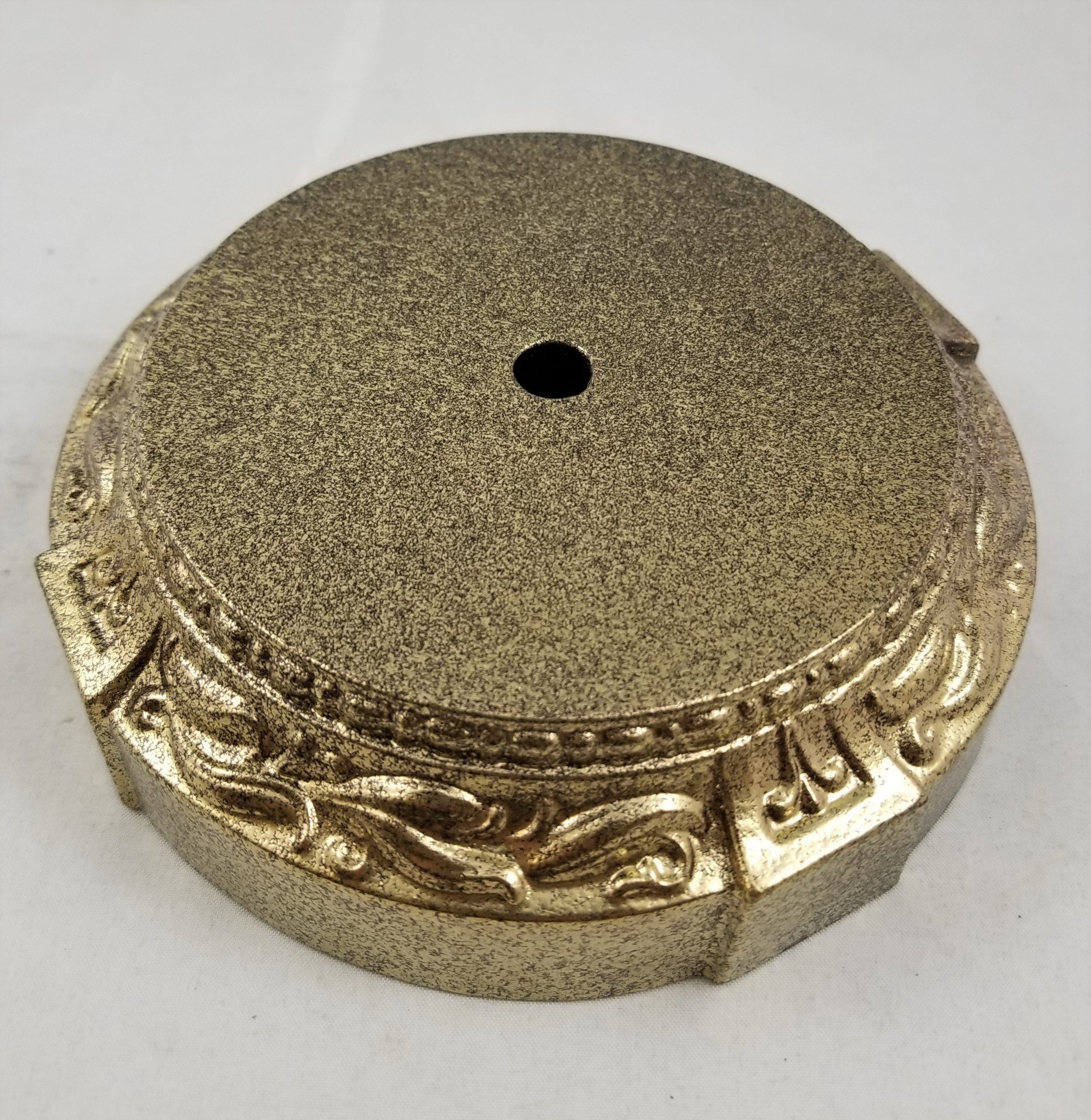 4-1/8" top, 1-9/16" ht, 5-7/16" bottom - cast metal base