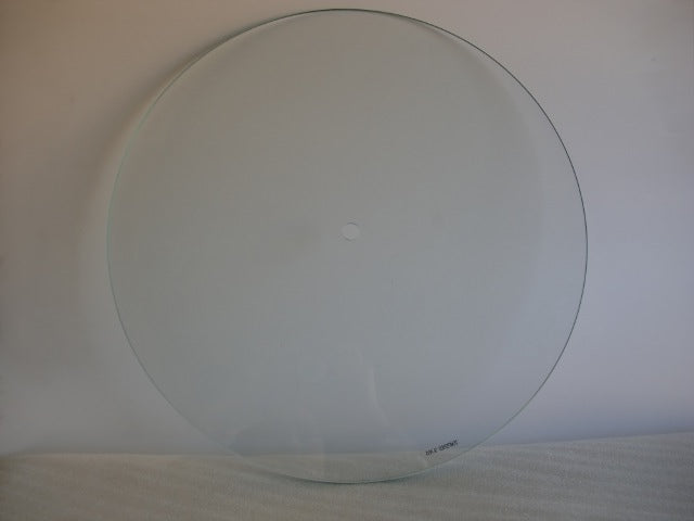 Flat Round Glass with a 9/16" center hole .