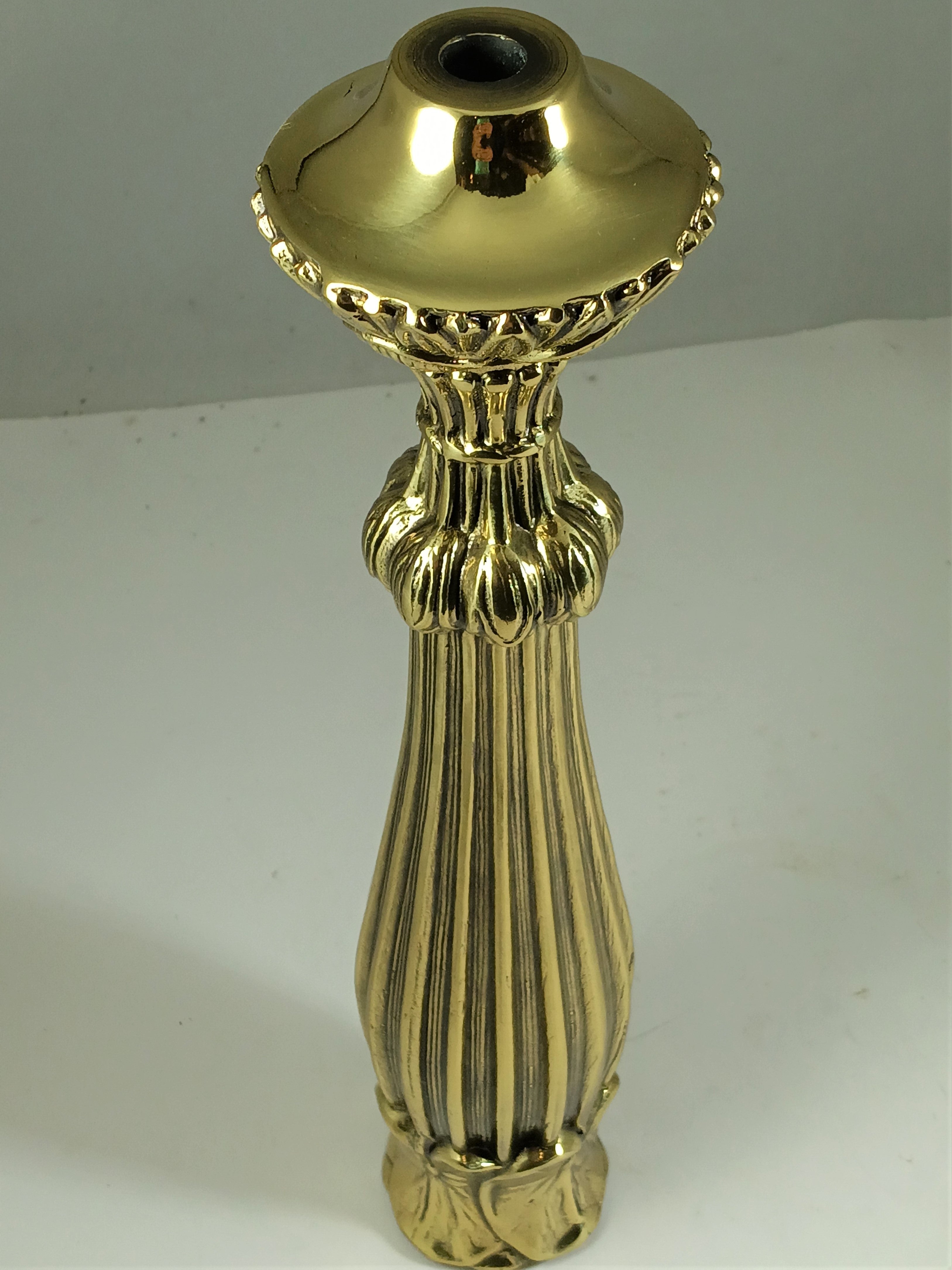 Elegant 12 inch Brass Flemish with botanical base and ribbed columns.